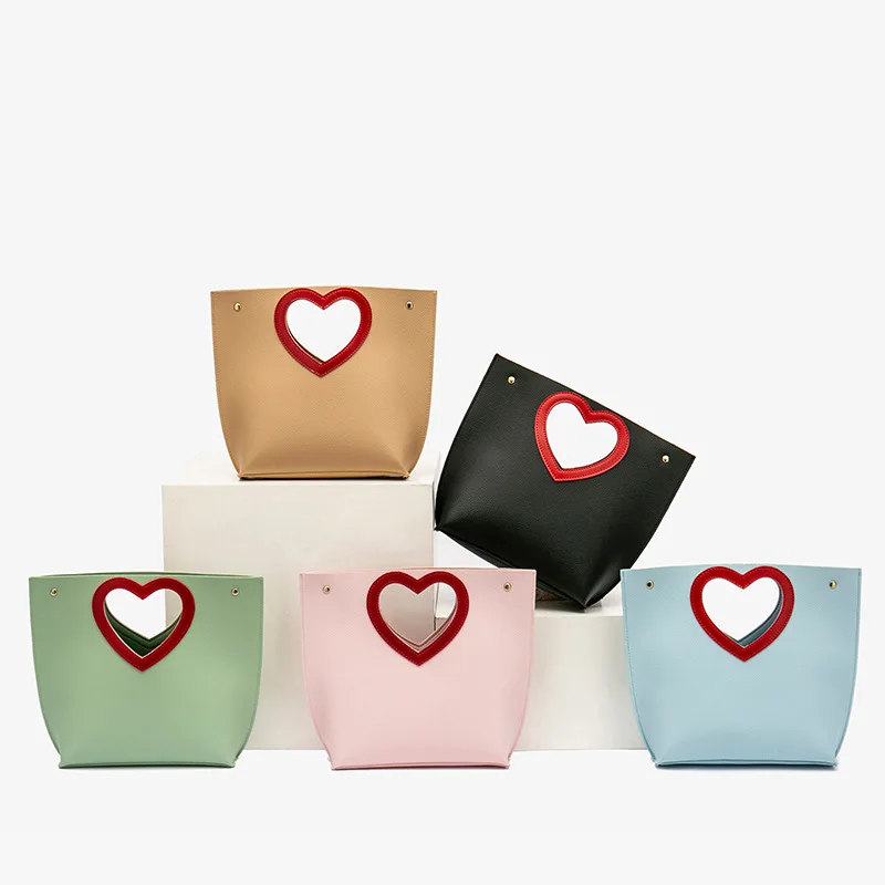 Meisjes schoudertas Hollow love handle handbag casual totes bag simple shoulder bag womens messenger crossbody bags bolso mujer
Meisjes schoudertas Hollow love handle handbag casual totes bag simple shoulder bag womens messenger crossbody bags bolso mujer