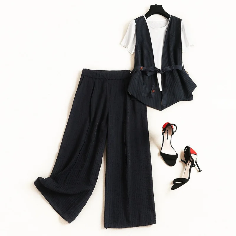 2019 new summer temperament commuter cardigan vest inside solid color T-shirt striped wide-leg pants three-piece
2019 new summer temperament commuter cardigan vest inside solid color T-shirt striped wide-leg pants three-piece