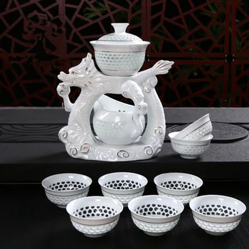 New Dragon Porcelain Dehua Kung Fu Tea Set Cups Automatic White Ceramic Hollow Transparent Blue and White Tea Pot Cup Sets
New Dragon Porcelain Dehua Kung Fu Tea Set Cups Automatic White Ceramic Hollow Transparent Blue and White Tea Pot Cup Sets