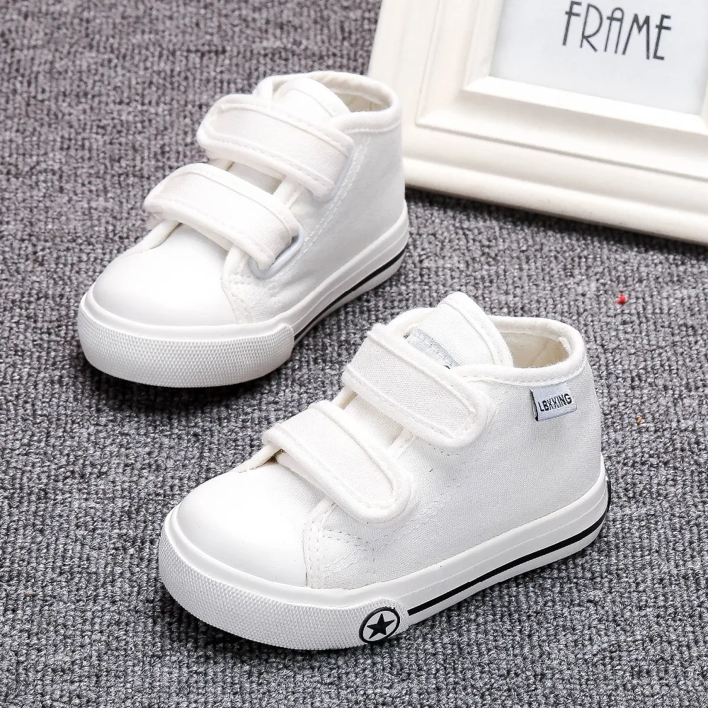 white canvas baby shoes