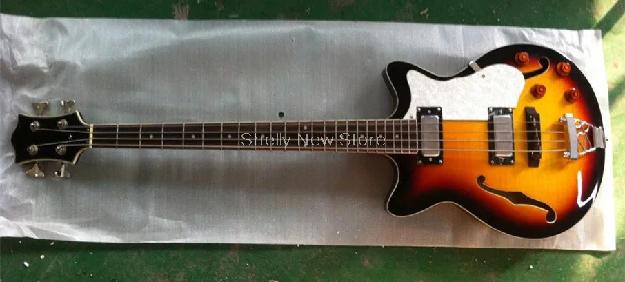 Shelly new store factory custom jazz hofner Violin bass 4 string white binding hollow body f hole tailpiece electric bass guitar
Shelly new store factory custom jazz hofner Violin bass 4 string white binding hollow body f hole tailpiece electric bass guitar