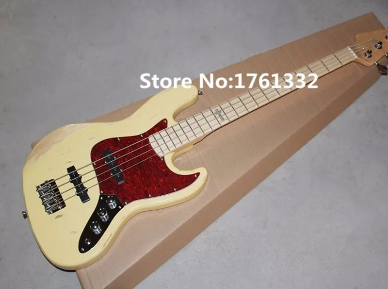 Factory custom 4 strings milk-yellow old style electric bass guitar with reverse headstockred pearl pickguard,can be changed
Factory custom 4 strings milk-yellow old style electric bass guitar with reverse headstockred pearl pickguard,can be changed