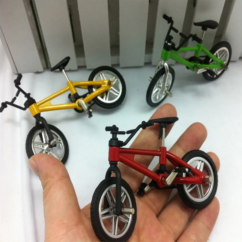 1:18 Mini Finger Toys Racing/Road bike Alloy Plastics Model Bicycle For Children's Birthday Christmas Gifts 3 pieces/ package 
1:18 Mini Finger Toys Racing/Road bike Alloy Plastics Model Bicycle For Children's Birthday Christmas Gifts 3 pieces/ package