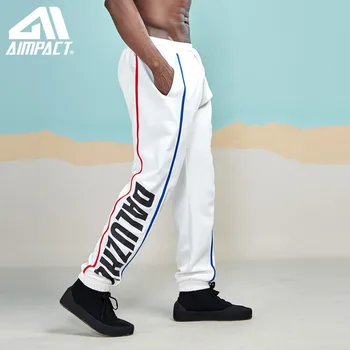 AIMPACT 2019 New High Street Elastic Waist Sweatpants Mens Jogger Pants Side Stripe Letter Track Pants Brand Trousers AM5055
AIMPACT 2019 New High Street Elastic Waist Sweatpants Mens Jogger Pants Side Stripe Letter Track Pants Brand Trousers AM5055