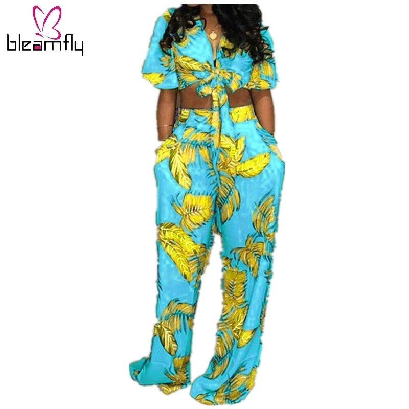 Summer Women's Set Short Sleeve Bow Tie Up Crop Top And Wide Led Pants Set Sweat Suit Tracksuit Women Floral Print Two Piece Set
Summer Women's Set Short Sleeve Bow Tie Up Crop Top And Wide Led Pants Set Sweat Suit Tracksuit Women Floral Print Two Piece Set