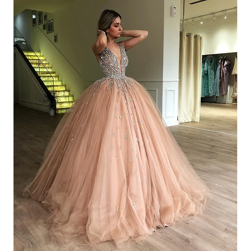 

Luxury Crystals Ball Gown Prom Dresses 2019 Illusion V Neck Champagne Tulle Plus Size Sequined Sweet 16 Arabic Dubai Quinceanera