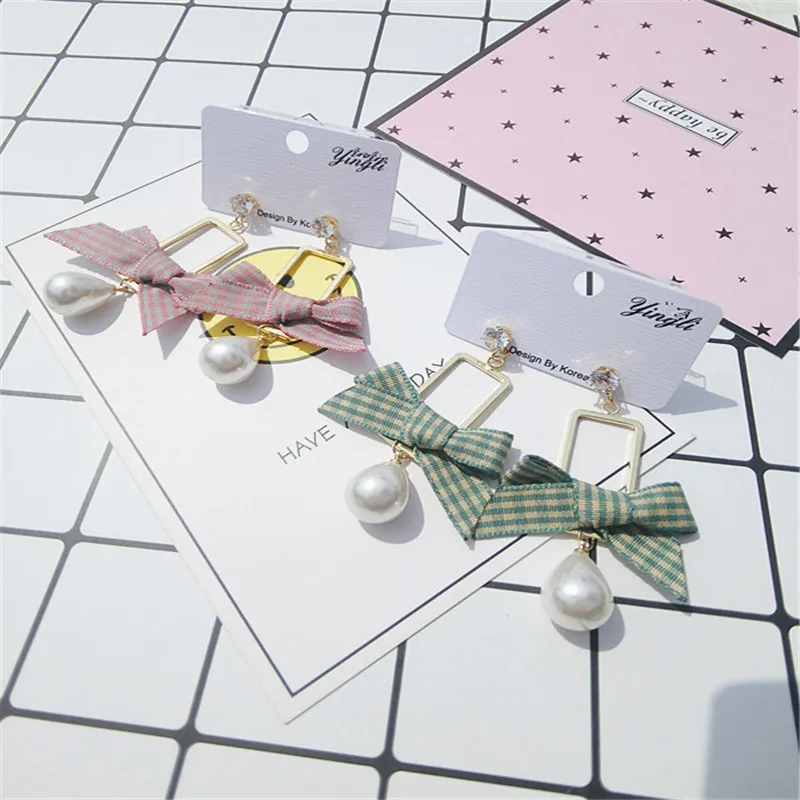 New Elegant Woman Water Drop Earrings Long Ribbon Striped Bowknot Fancy Dangle Earrings Fashion Jewelry
New Elegant Woman Water Drop Earrings Long Ribbon Striped Bowknot Fancy Dangle Earrings Fashion Jewelry