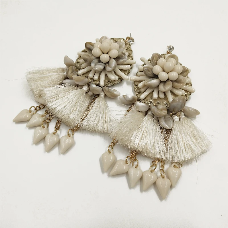 Rongho Bohemia Shell flower statement earrings for women Brincos boho Tassel earring pendant Ethnic Chunky jewelry
Rongho Bohemia Shell flower statement earrings for women Brincos boho Tassel earring pendant Ethnic Chunky jewelry