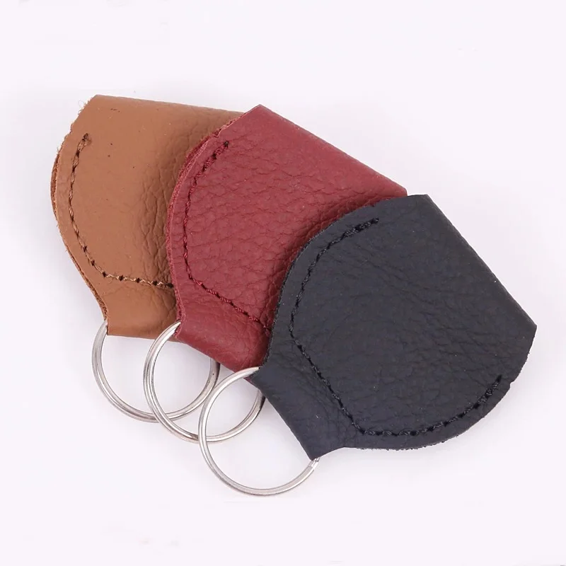 Guitar Pick Holder Genuine Leather Guitarra Plectrum Case Bag Keychain Shape Guitar Accessories
Guitar Pick Holder Genuine Leather Guitarra Plectrum Case Bag Keychain Shape Guitar Accessories