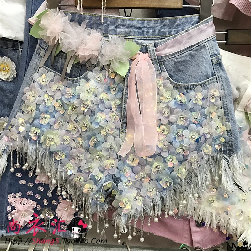 Spring and Summer New Heavy Rhinestone Sequin Flower Beaded Tassel Jeans Shorts Women Fashion High Waist Denim Shorts
Spring and Summer New Heavy Rhinestone Sequin Flower Beaded Tassel Jeans Shorts Women Fashion High Waist Denim Shorts