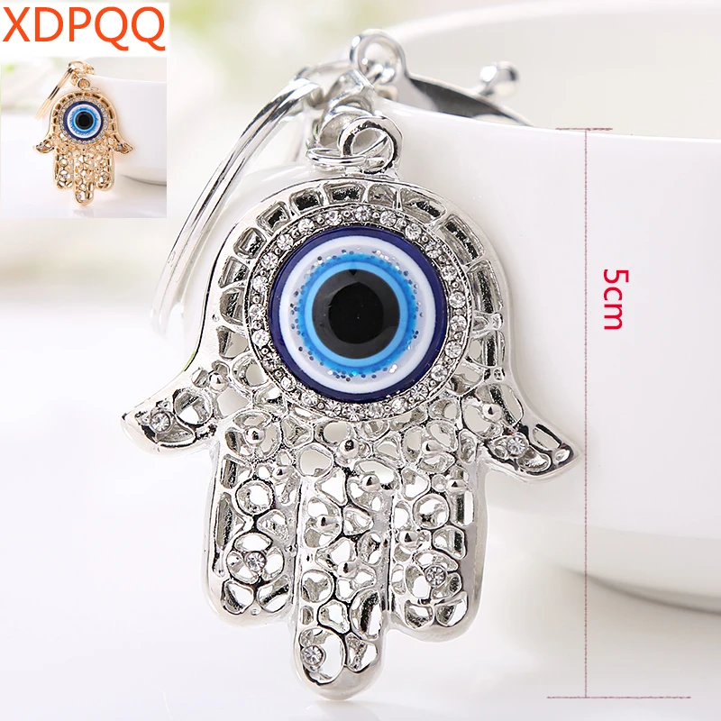 XDPQQ novelty 3D palm bright eye Feng Shui keychain metal car pendant backpack pendant ladies gift jewelry
XDPQQ novelty 3D palm bright eye Feng Shui keychain metal car pendant backpack pendant ladies gift jewelry