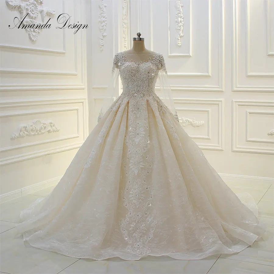 Amanda Design High Quality Long Sleeve Lace Applique Pearls Champagne Wedding Dress
Amanda Design High Quality Long Sleeve Lace Applique Pearls Champagne Wedding Dress