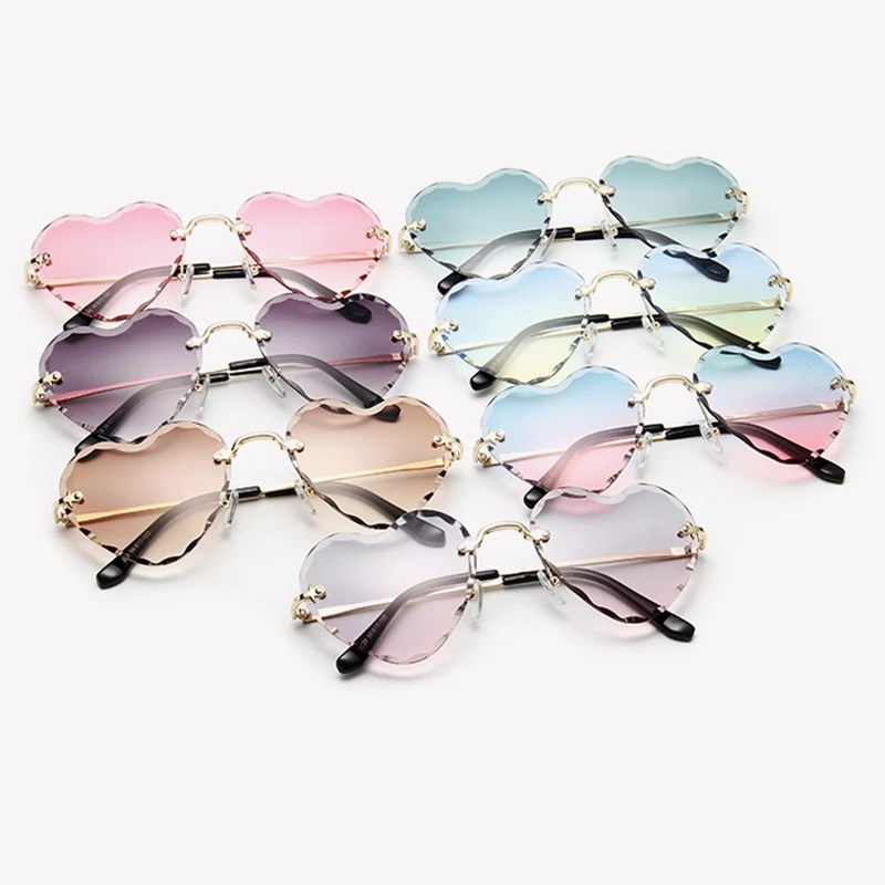 New Love Heart Sunglasses Women Fashion Rimless Sun Glasses Cute Sexy Candy Colors Ladies Eyewear UV400
New Love Heart Sunglasses Women Fashion Rimless Sun Glasses Cute Sexy Candy Colors Ladies Eyewear UV400