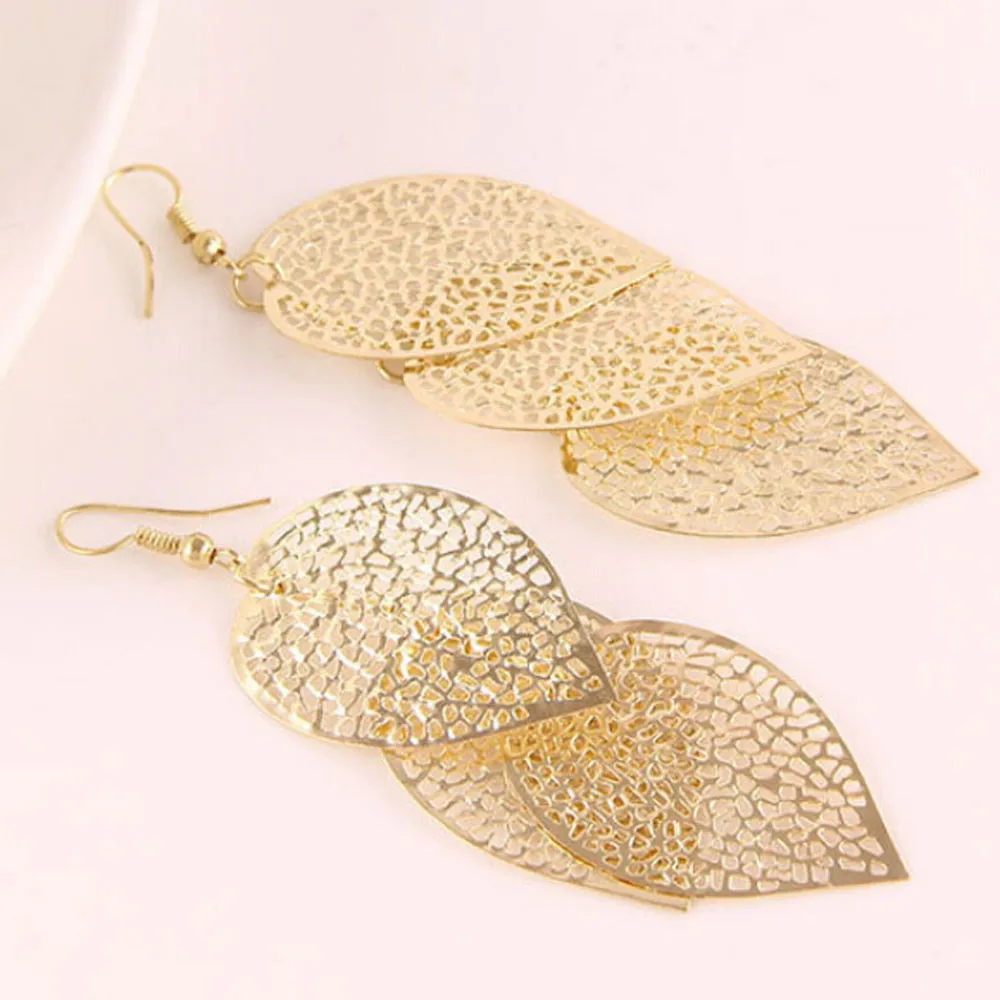 1Pair Women Earrings Alloy Hollow Leaves Dangle Earings Eardrop Jewelry Oorbellen Fantasy Bijoux Stylish Ornaments Pendant
1Pair Women Earrings Alloy Hollow Leaves Dangle Earings Eardrop Jewelry Oorbellen Fantasy Bijoux Stylish Ornaments Pendant