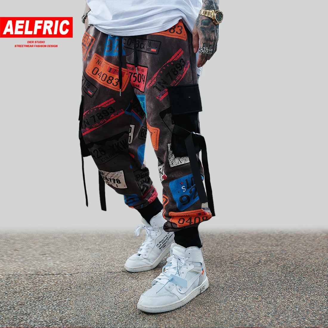 AELFRIC Hip Hop Color Block Graffiti Cargo Pants Mens Harajuku Streetwear Casual Ribbons Male Sweatpants Harem Joggers Trousers
AELFRIC Hip Hop Color Block Graffiti Cargo Pants Mens Harajuku Streetwear Casual Ribbons Male Sweatpants Harem Joggers Trousers