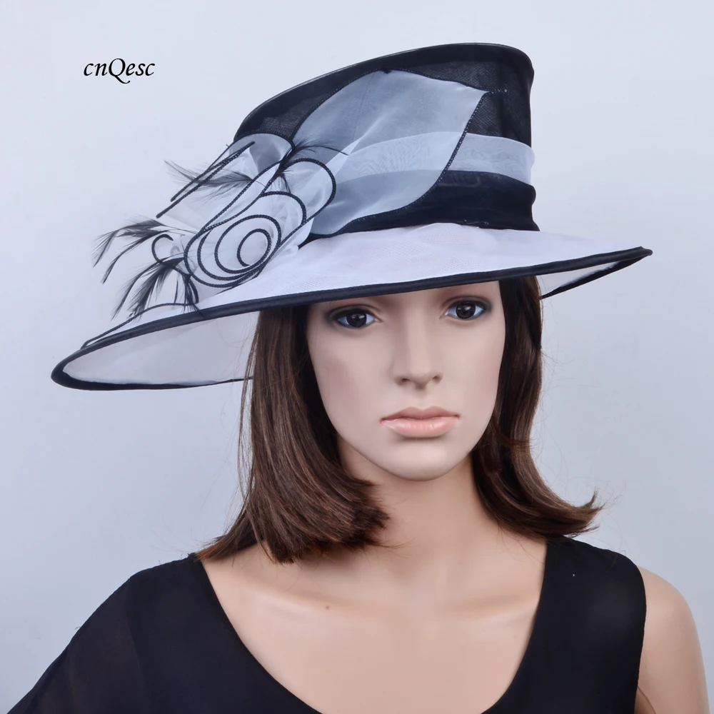 White black Organza hat bridal fascinator sinamay hat Wedding Church Hat kentucky derby hat.
White black Organza hat bridal fascinator sinamay hat Wedding Church Hat kentucky derby hat.