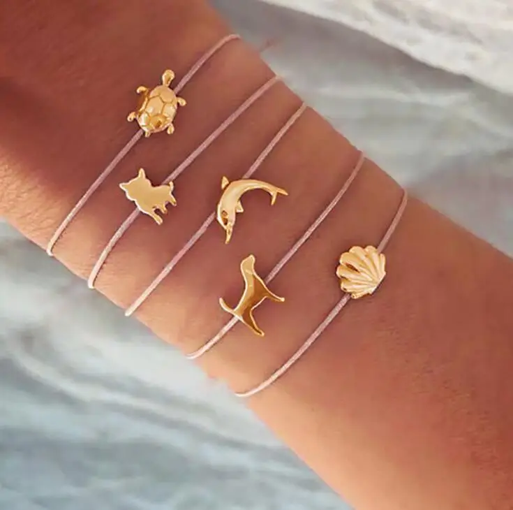 Bohemian sweet Cute Gold Cat Turtle Dolphin Shell Dog Bracelets For Women Girls Beige Rope Chain Bracelets Sets Jewelry gift
Bohemian sweet Cute Gold Cat Turtle Dolphin Shell Dog Bracelets For Women Girls Beige Rope Chain Bracelets Sets Jewelry gift