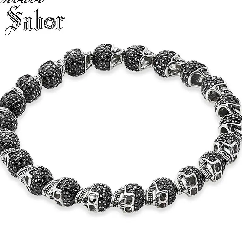 thomas Black Zirconia Paved Skulls Bead Bracelet Elastic Heart Bracelet 925 Sterling Silver Rebel Punk Jewelry for Men female
thomas Black Zirconia Paved Skulls Bead Bracelet Elastic Heart Bracelet 925 Sterling Silver Rebel Punk Jewelry for Men female