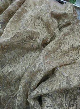 2016 Latest Gold African French Lace Fabric High Quality African Tulle Lace with stones Fabric For Wedding dress 
2016 Latest Gold African French Lace Fabric High Quality African Tulle Lace with stones Fabric For Wedding dress