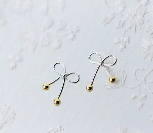 1pair 100% REAL. 925 Sterling Silver Fine Jewelry Open Hollow Bowknot with golden round beads Stud Earrings Women's GTLE2157
1pair 100% REAL. 925 Sterling Silver Fine Jewelry Open Hollow Bowknot with golden round beads Stud Earrings Women's GTLE2157