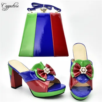 Hot sale green with royal blue and red design African lady shoes and bag sets 526-1, heel height 10cm
Hot sale green with royal blue and red design African lady shoes and bag sets 526-1, heel height 10cm