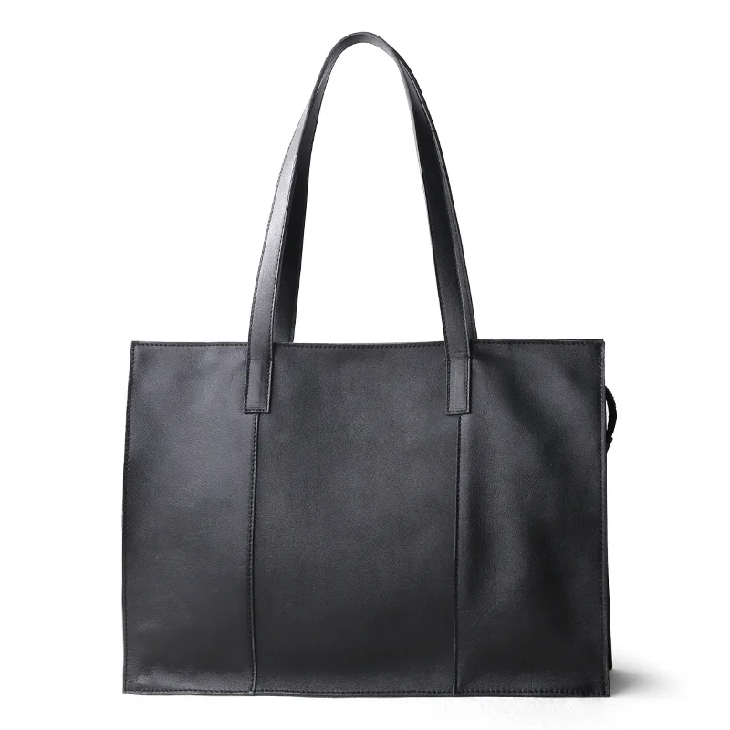 New genuine leather briefcase with cowhide cover, simple bag and large capacity Commuter Bag
New genuine leather briefcase with cowhide cover, simple bag and large capacity Commuter Bag