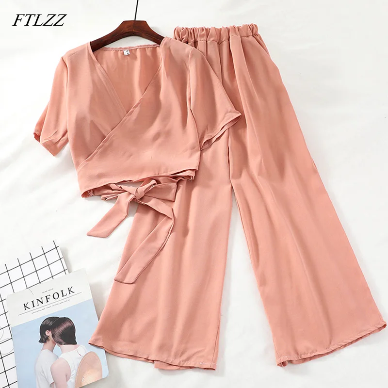 FTLZZ Women Beach Style Two Piece Set Top And Pants Lace Up Short V-neck Blouses Elastic High Waist Wide Leg Pants Set
FTLZZ Women Beach Style Two Piece Set Top And Pants Lace Up Short V-neck Blouses Elastic High Waist Wide Leg Pants Set