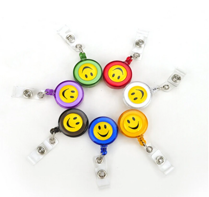 Image 10 pcs lot Compact Design Smiling Face ID Holder Name Tag Card key Badge Holder Retractable Round Solid Translucent ID Holder
