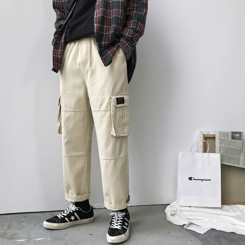 Summer Suit New Neutral Loose Pendant Wide Leg Straight Tube Solid Color Large Pocket Joggers Streetwear Pants Men
Summer Suit New Neutral Loose Pendant Wide Leg Straight Tube Solid Color Large Pocket Joggers Streetwear Pants Men