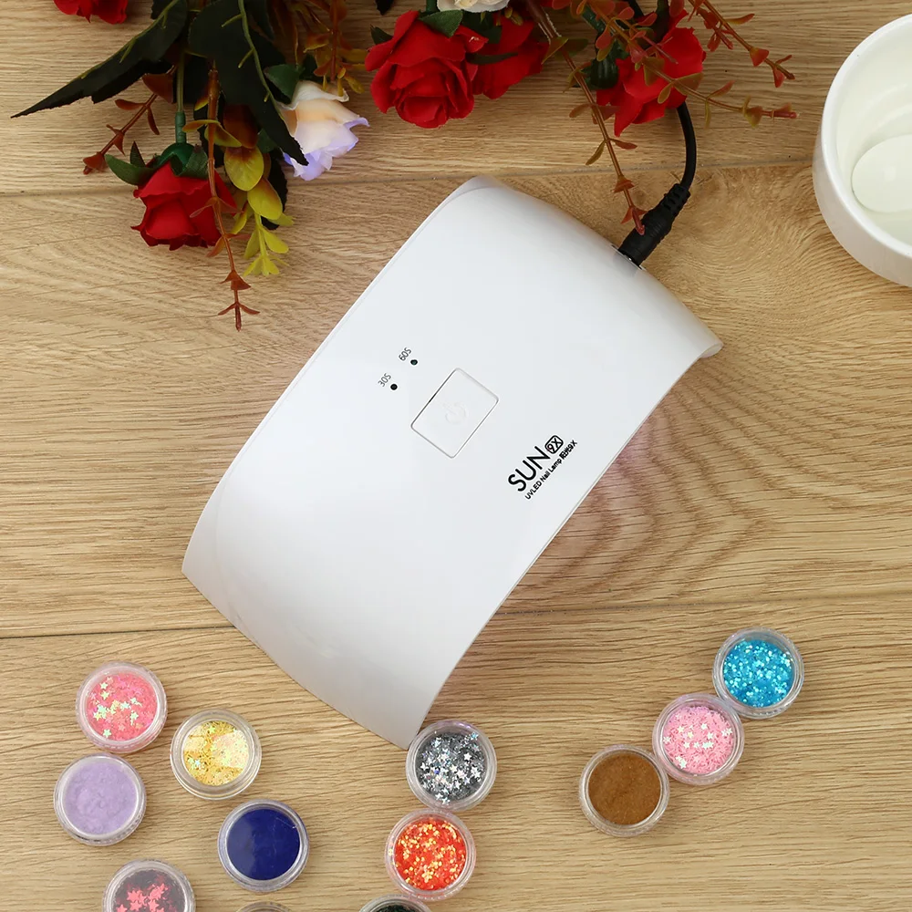 SUN 9X 18W Dual UV LED Nail Lamp Nail Dryer 9 LEDs Manicure Tools Gel Polish Curing Light Lamp 30s/60s Timers Nail Art Equipment
SUN 9X 18W Dual UV LED Nail Lamp Nail Dryer 9 LEDs Manicure Tools Gel Polish Curing Light Lamp 30s/60s Timers Nail Art Equipment