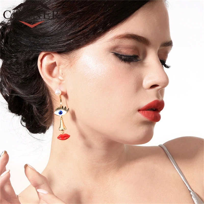 CANNER Fashion Personality Irregular Imitation Pearl Enamel Glaze Drop Earring Nose Red Mouth Evil Eye Earrings for Women FO
CANNER Fashion Personality Irregular Imitation Pearl Enamel Glaze Drop Earring Nose Red Mouth Evil Eye Earrings for Women FO