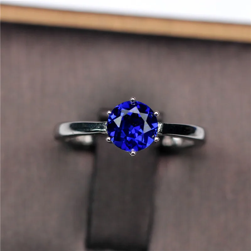 1CT blue stone ring S925 silver colored stone rings blue with purple classic six claw Setting Simple women gifts
1CT blue stone ring S925 silver colored stone rings blue with purple classic six claw Setting Simple women gifts