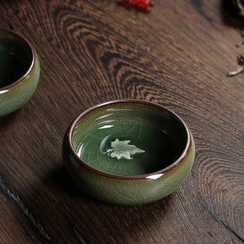 Chinese Longquan Celadon China Teacups and SaucerTea Bowl with Clouds and Leaves 46ml Porcelain Tea Pot Coffee Cup High Quality
Chinese Longquan Celadon China Teacups and SaucerTea Bowl with Clouds and Leaves 46ml Porcelain Tea Pot Coffee Cup High Quality