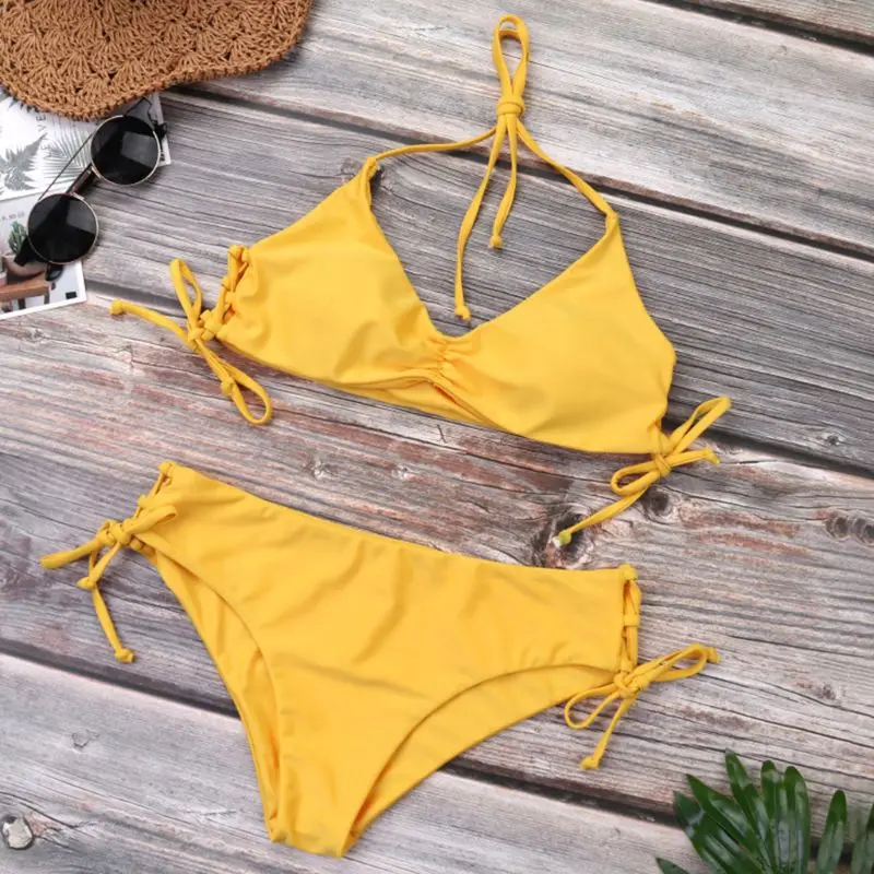 Fashion Women Sexy Two Piece Set Halter Deep V-Neck Ruched Pleated Bra Solid Yellow Color Mid Waist Bowknot
Fashion Women Sexy Two Piece Set Halter Deep V-Neck Ruched Pleated Bra Solid Yellow Color Mid Waist Bowknot