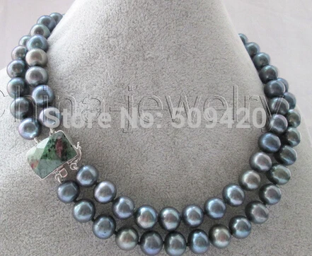 W&O656 >>Beautiful AA 17-18 "2row 12mm black round freshwater pearl necklace - 925 silver
W&O656 >>Beautiful AA 17-18 "2row 12mm black round freshwater pearl necklace - 925 silver
