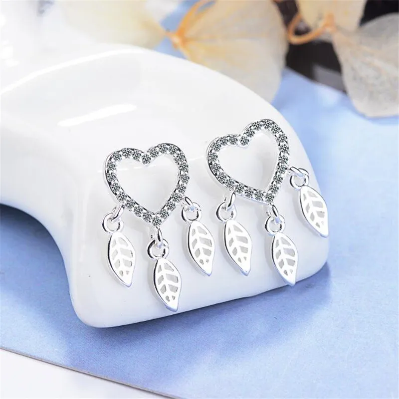 Fashion Dream Catcher Feather Personality 925 Sterling Silver Jewelry Love Heart-shaped Crystal Temperament Stud Earrings SE701
Fashion Dream Catcher Feather Personality 925 Sterling Silver Jewelry Love Heart-shaped Crystal Temperament Stud Earrings SE701