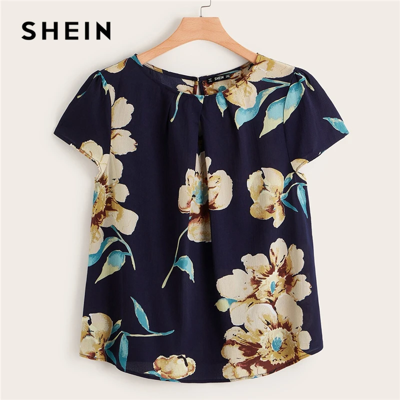 SHEIN Plus Flower Print Keyhole Back Blouse Navy Women Tops 2019 Boho Button Summer Round Neck Short Sleeve Blouses
SHEIN Plus Flower Print Keyhole Back Blouse Navy Women Tops 2019 Boho Button Summer Round Neck Short Sleeve Blouses