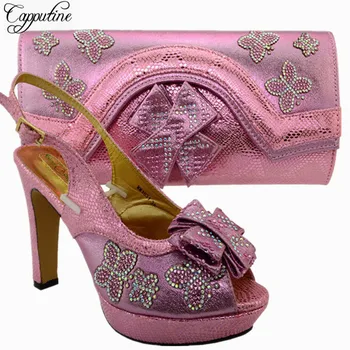 Amazing pink wedding/party African sandal shoes and handbag set with stones for lady MM1031 heel height 11.5cm
Amazing pink wedding/party African sandal shoes and handbag set with stones for lady MM1031 heel height 11.5cm
