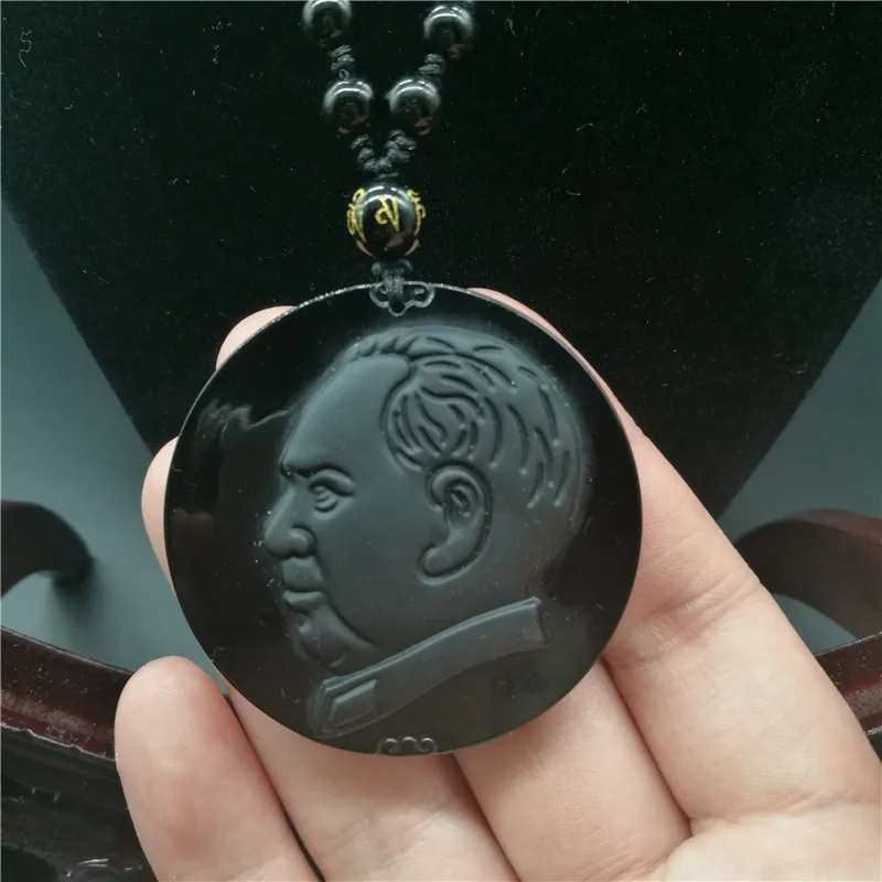 Natural black stone Chairman Mao Like chapter Pendant Benming years mascot Body care necklace
Natural black stone Chairman Mao Like chapter Pendant Benming years mascot Body care necklace