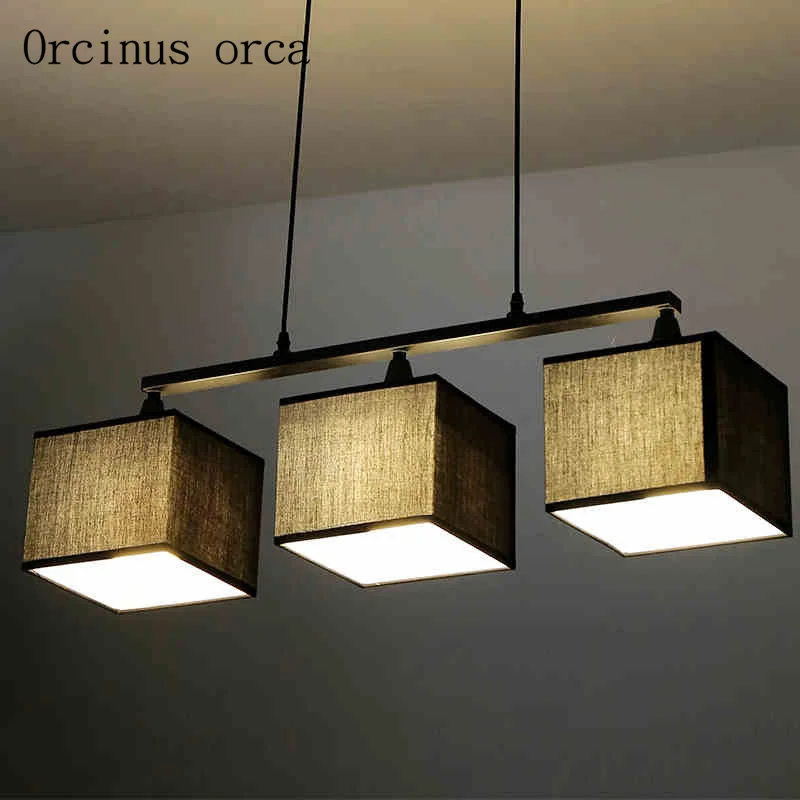 Creative restaurant lamp bar three fabric modern minimalist bedroom study lamp American Nordic Chandelier
Creative restaurant lamp bar three fabric modern minimalist bedroom study lamp American Nordic Chandelier