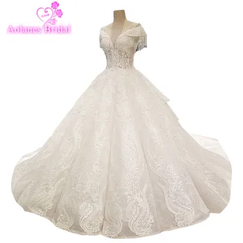 AOLANES 2018 Champagne Tulle V-neck Sleeveless Bridal Gowns Cathedral Train Waves Ball Gown Princess Vintage Wedding Dresses
AOLANES 2018 Champagne Tulle V-neck Sleeveless Bridal Gowns Cathedral Train Waves Ball Gown Princess Vintage Wedding Dresses