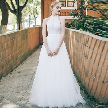 Holievery Robe Mariage 2019 Halter Neck Tulle Beach Wedding Dresses with Lace Top Floor Length Bridal Dress Abiti Da Sposa
Holievery Robe Mariage 2019 Halter Neck Tulle Beach Wedding Dresses with Lace Top Floor Length Bridal Dress Abiti Da Sposa