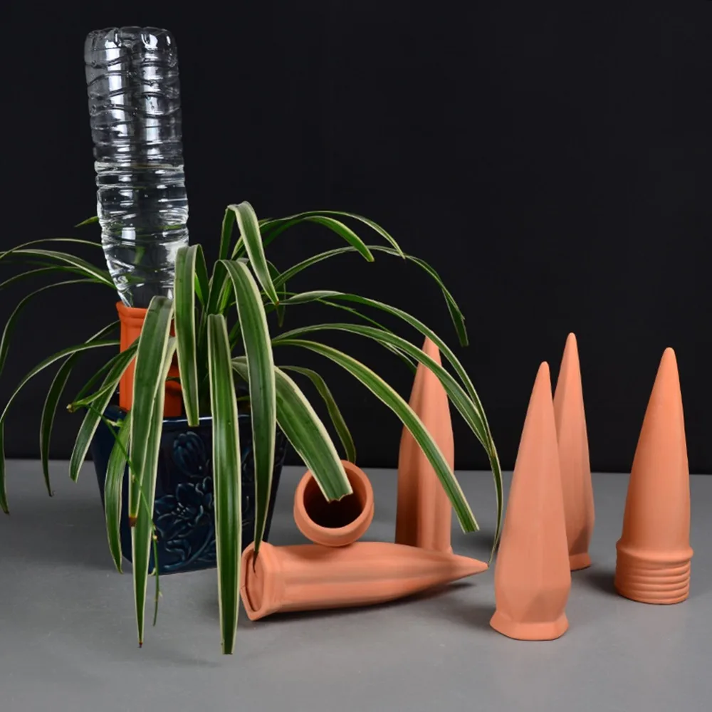 4pcs Watering Stakes Flower Bonsai Pot Plant Self Irrigation Watering System Red Terracotta Garden Watering Spikes
4pcs Watering Stakes Flower Bonsai Pot Plant Self Irrigation Watering System Red Terracotta Garden Watering Spikes