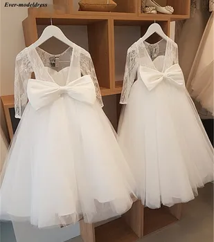 Lovely 2019 Flower Girls Dresses For Weddings Long Sleeves With Big Bow Lace Tulle Floor Length Birthday Party Gowns Customized
Lovely 2019 Flower Girls Dresses For Weddings Long Sleeves With Big Bow Lace Tulle Floor Length Birthday Party Gowns Customized