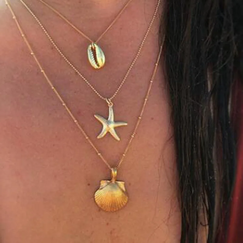 2019 Summer Fashion Gold Color Multi-Layered Starfish Shell Scallop Pendant Necklaces For Women Lady's Boho Necklace Jewelry
2019 Summer Fashion Gold Color Multi-Layered Starfish Shell Scallop Pendant Necklaces For Women Lady's Boho Necklace Jewelry