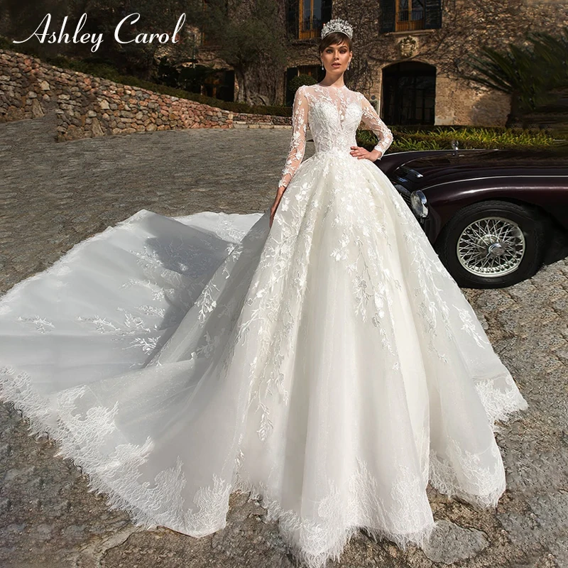 Ashley Carol Sexy O-Neck Long Sleeve Lace Ball Gown Wedding Dresses 2019 Luxury Royal Train Bride Dress Princess Wedding Gowns 
Ashley Carol Sexy O-Neck Long Sleeve Lace Ball Gown Wedding Dresses 2019 Luxury Royal Train Bride Dress Princess Wedding Gowns