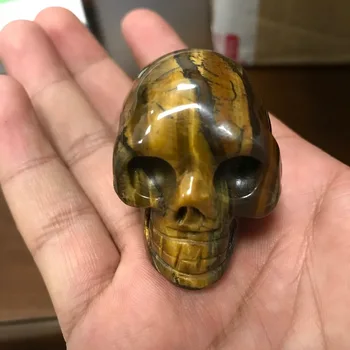The tiger's eye stone skull and skull head set is a collection of natural crystal stone British antiques carved by Chinese maste
The tiger's eye stone skull and skull head set is a collection of natural crystal stone British antiques carved by Chinese maste