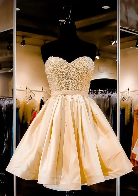 Gold Sweetheart Junior Homecoming Dresses Satin Beaded A Line Graduation Dresses Mini Length Backless Mezuniyet Elbiseleri 2019
Gold Sweetheart Junior Homecoming Dresses Satin Beaded A Line Graduation Dresses Mini Length Backless Mezuniyet Elbiseleri 2019