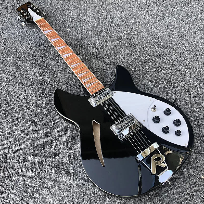Black 12-string guitar,Rickenback360Electric Guitar,have two output ,rosewood fingerboard has the gloss of varnish on it
Black 12-string guitar,Rickenback360Electric Guitar,have two output ,rosewood fingerboard has the gloss of varnish on it
