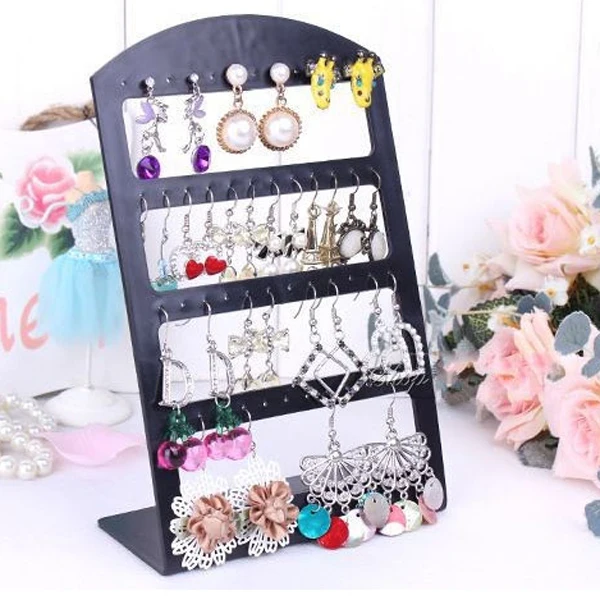 Portable 24 Holes 12 Pairs Earrings Ear Studs Jewelry Plastic Display Stand Rack Holder Organizer (Black)
Portable 24 Holes 12 Pairs Earrings Ear Studs Jewelry Plastic Display Stand Rack Holder Organizer (Black)